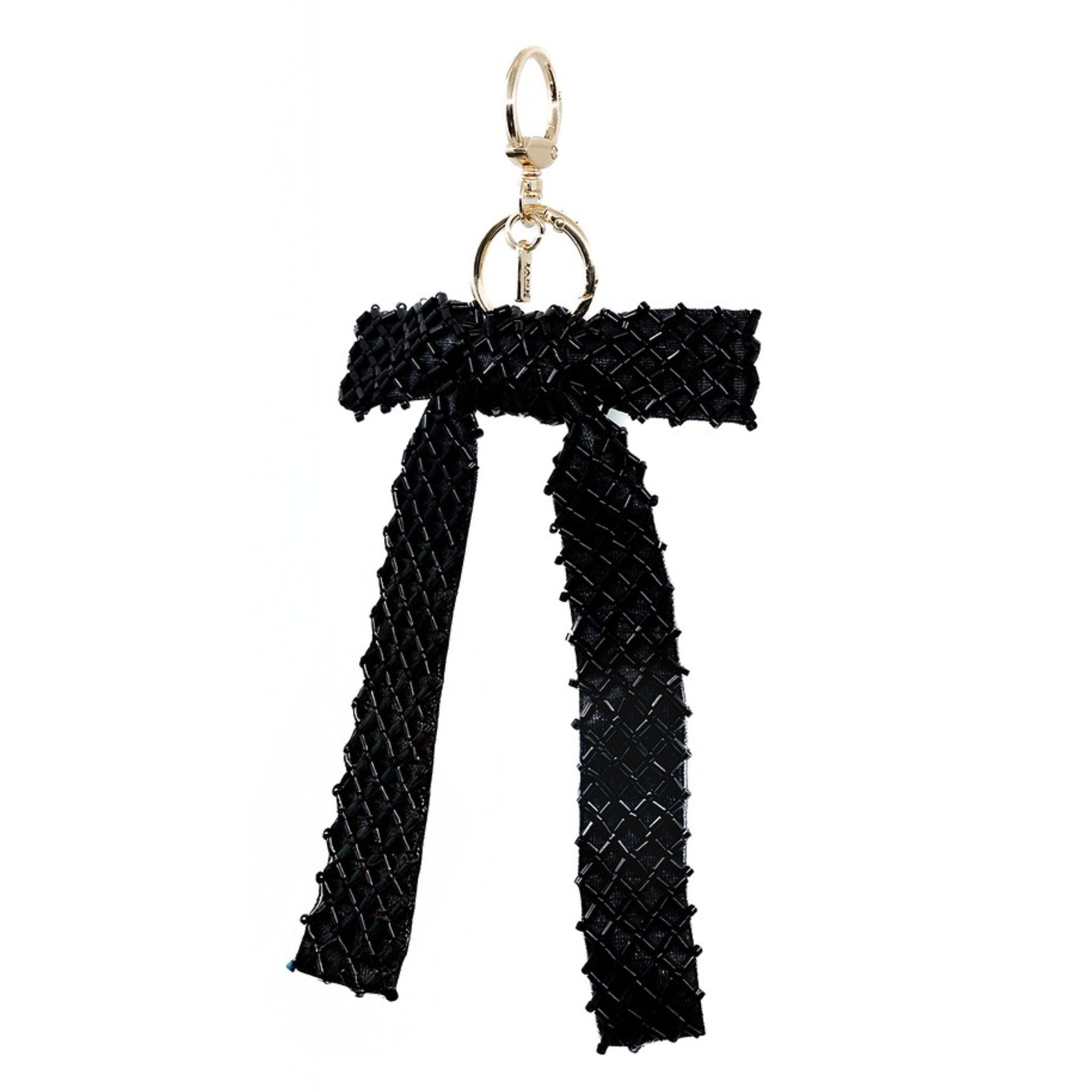 Add a touch of elegance to your accessories with this black beaded cross-stitch bow charm. Its intricate design and shimmering beads bring a refined and sophisticated flair to your bag or keychain. Perfect for those who appreciate timeless beauty and understated glamour. Cross Stitch Beaded Bow in Black