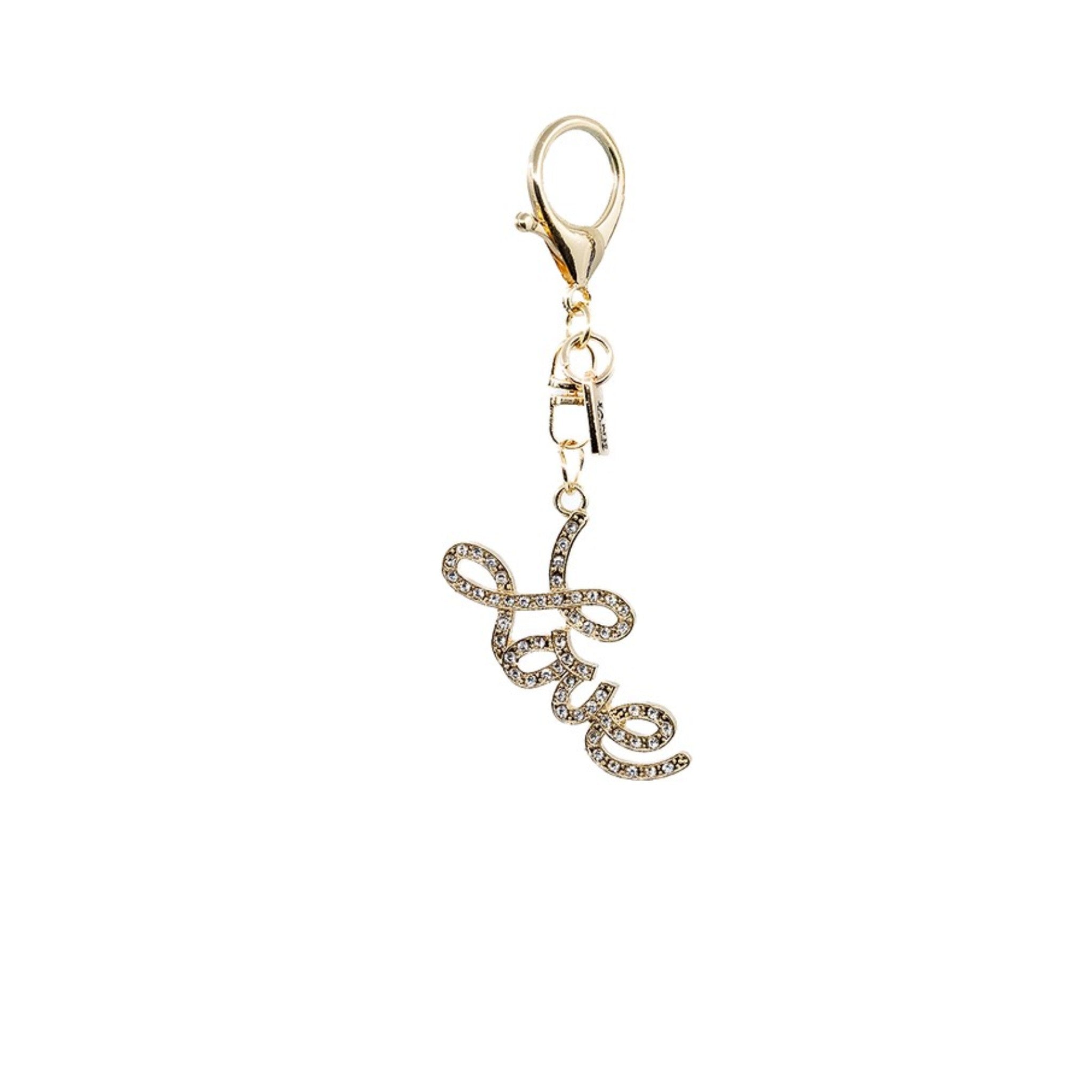 Add a touch of romance with this gold love script charm. The intricate design and shimmering finish bring a warm and elegant glow, perfect for expressing affection and appreciation.
