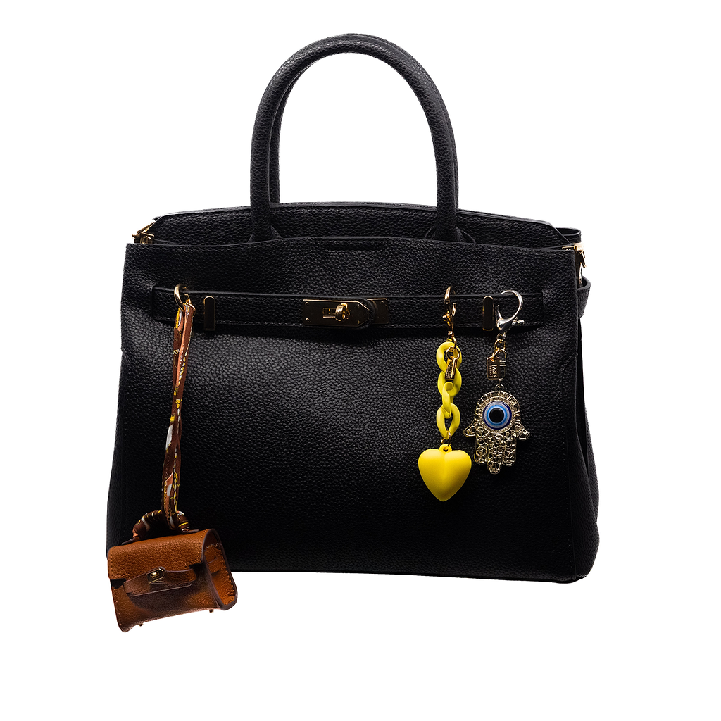 This mini brown Birkin-inspired bag charm exudes timeless sophistication. Its classic design and rich hue make it a versatile addition to any accessory collection. Not just a charm, it doubles as a stylish AirPod holder, combining fashion with functionality.