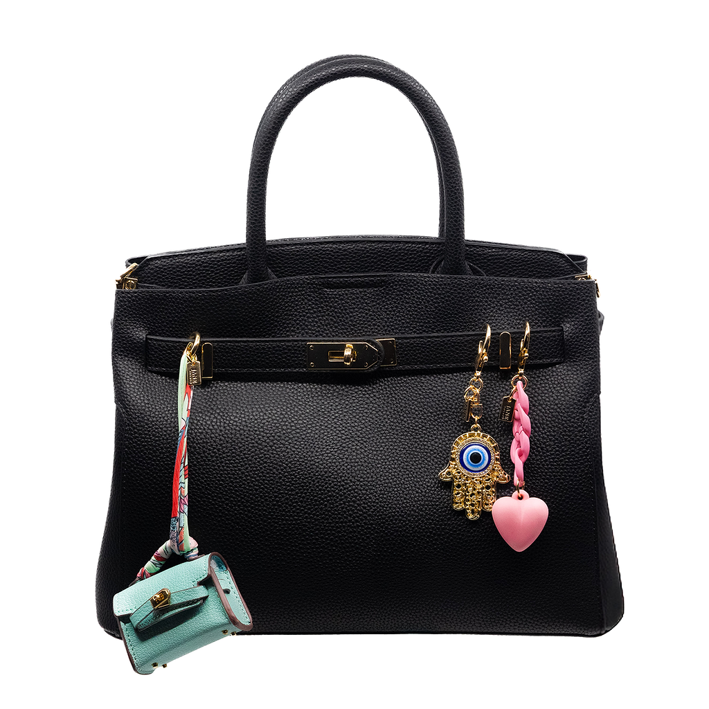 This mini blue Birkin-inspired bag charm adds a refreshing pop of color to your purse. Its vibrant hue and sleek design make it a standout accessory. It can also double as a stylish AirPod holder, combining fashion with functionality.