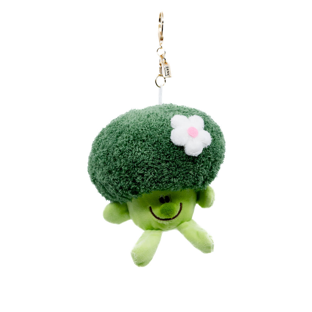 Turn heads with this quirky and cuddly Broccoli Buddy! With a soft, fluffy texture, a sweet embroidered smile, and a delicate flower accent, this charm adds a playful twist to your bag. Perfect for anyone who loves their greens with a side of charm.