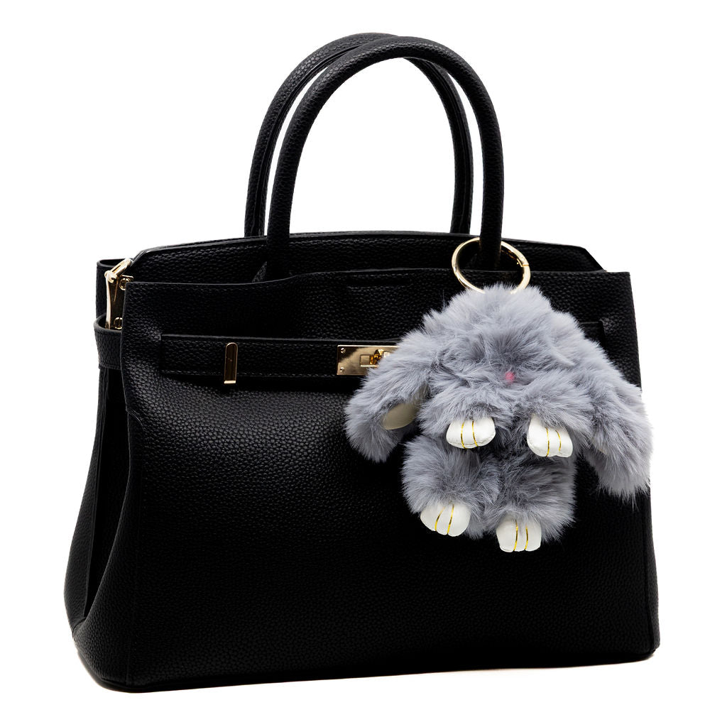 The same cozy softness as our white bunny—now in a smoky grey hue. Perfect for neutral-toned bags.