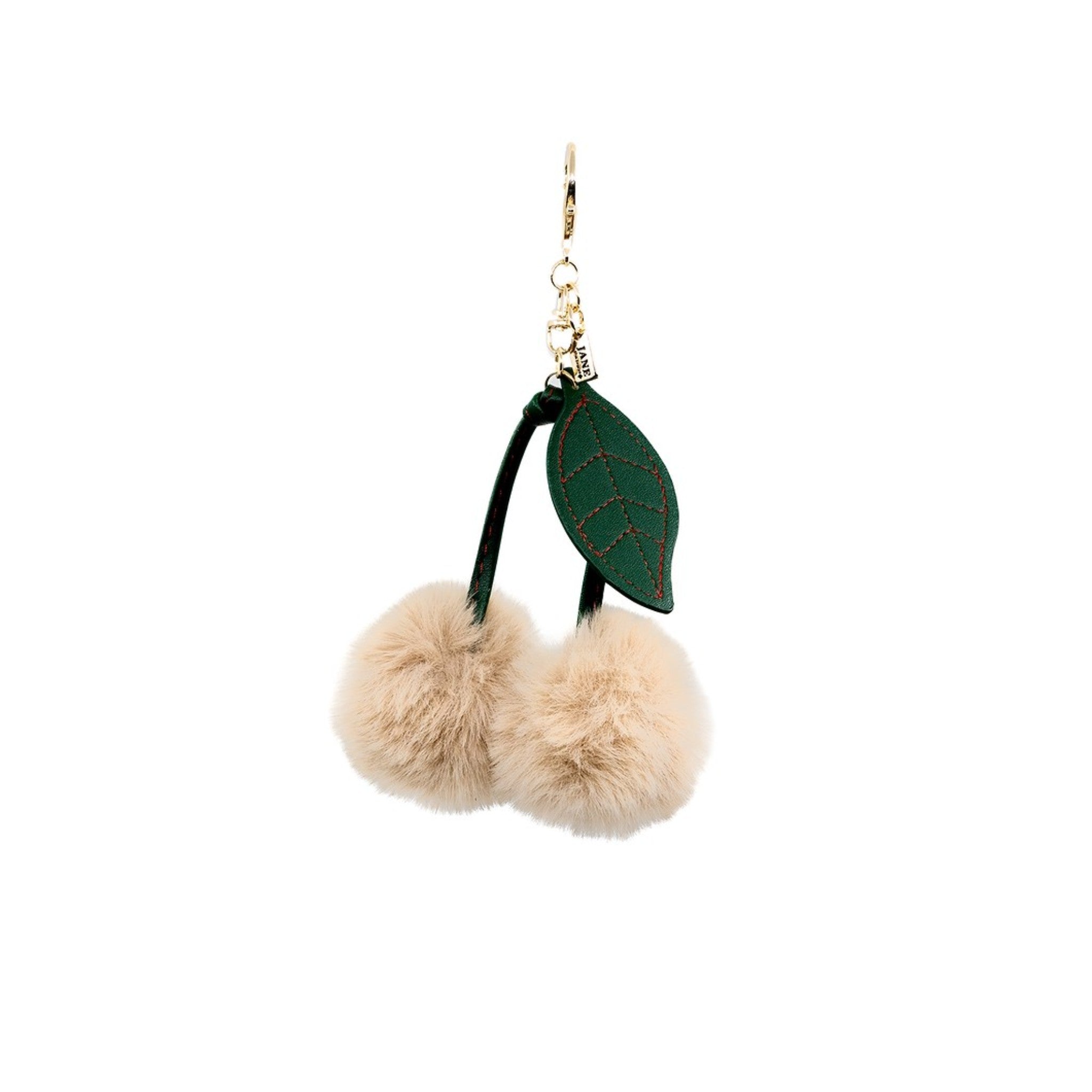 Add a playful pop to your ensemble with this cream cherry pom charm. Its soft texture and subtle colour bring a whimsical touch, making it a delightful addition to your bag or keychain. A sweet way to express your fun-loving personality.