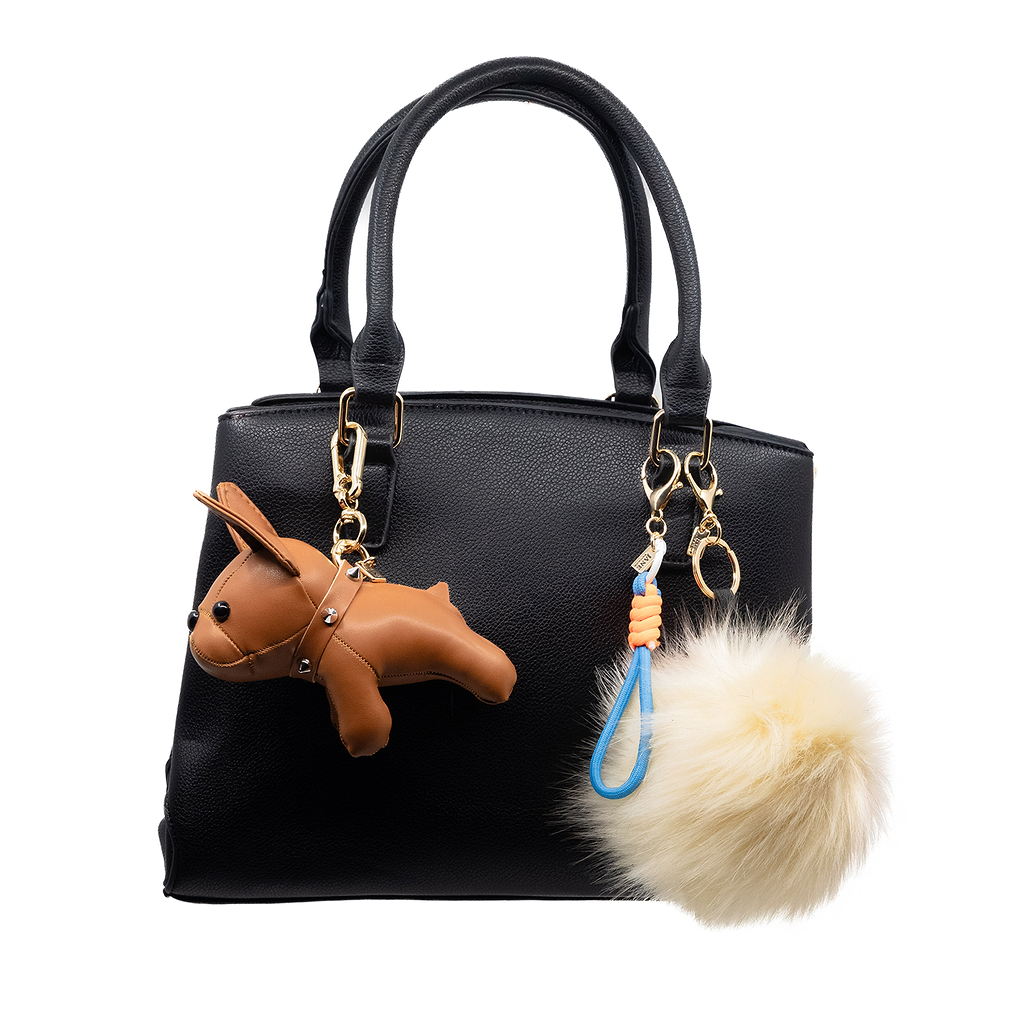 Celebrate loyalty with this brown bulldog charm. Its warm colour and steadfast expression embody devotion and reliability, making it a heartfelt addition to your accessories.