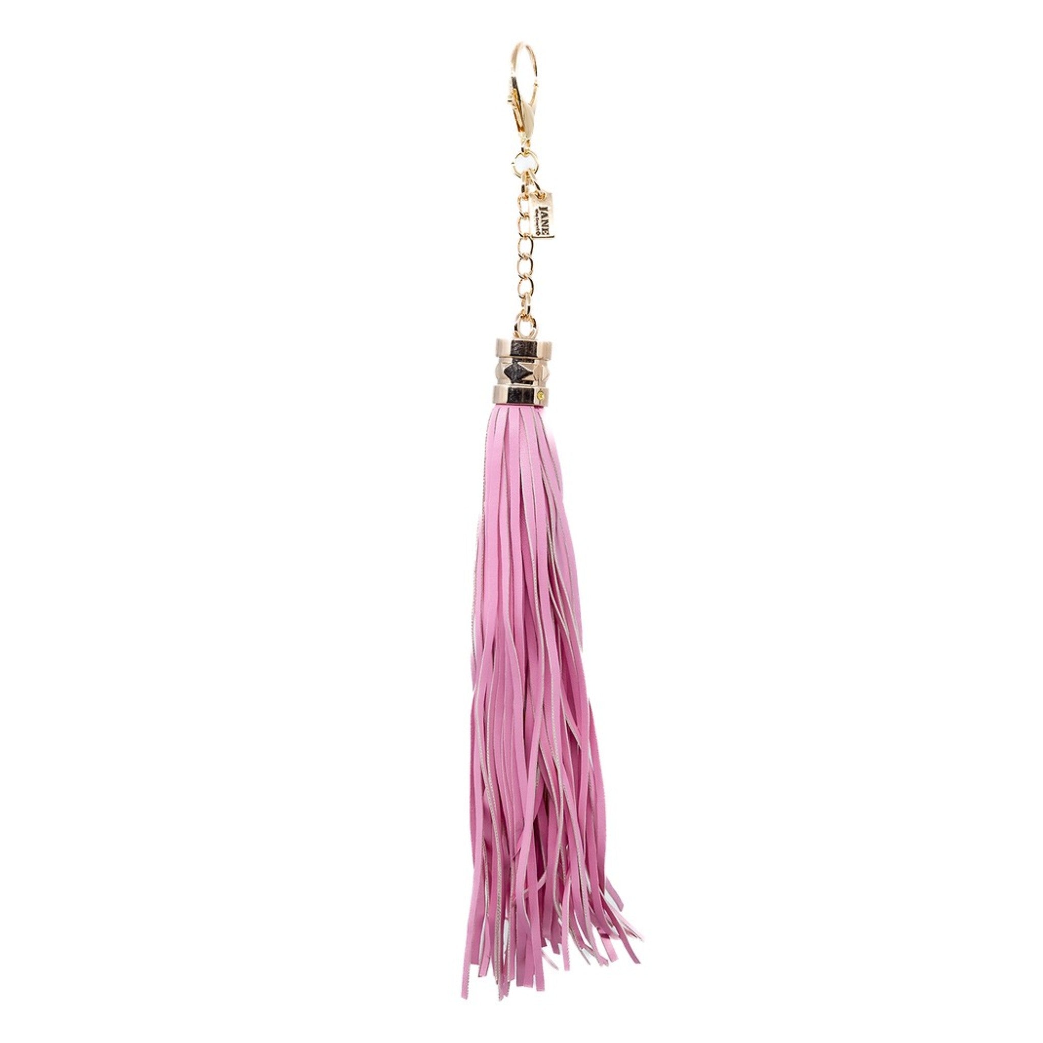 Bring a touch of bohemian flair with this pink faux-leather tassel charm. Its sleek design adds movement and texture, perfect for layering on your bag. The soft pink hue complements various styles, making it a versatile accessory for any occasion.