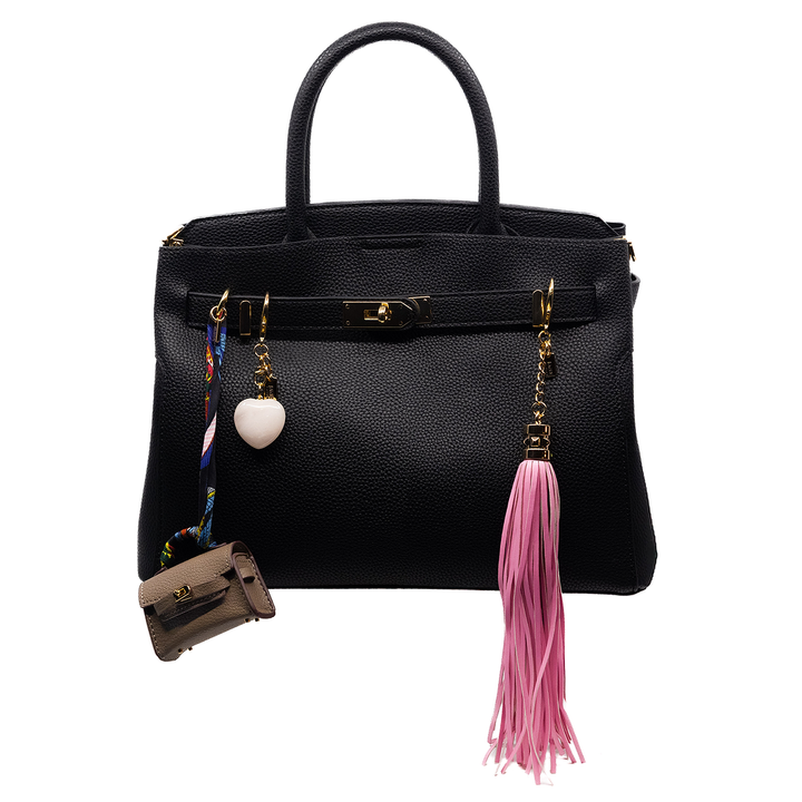 Bring a touch of bohemian flair with this pink faux-leather tassel charm. Its sleek design adds movement and texture, perfect for layering on your bag. The soft pink hue complements various styles, making it a versatile accessory for any occasion.