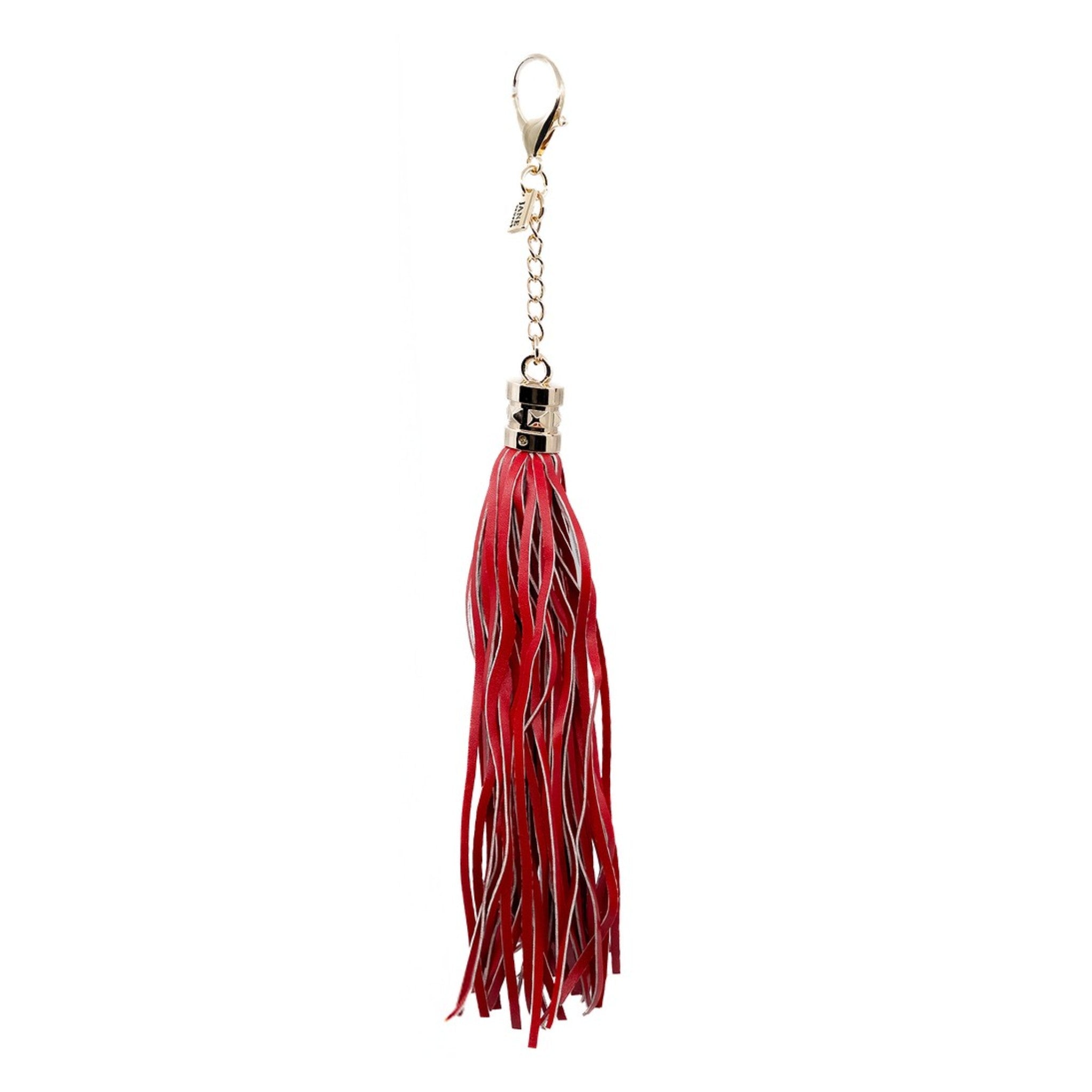 Bring a touch of bohemian flair with this long faux-leather tassel. Its sleek design adds movement and texture, perfect for layering on your bag.