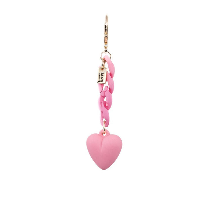 Express love and affection with this pink chain-link heart charm. Its soft pink color and modern design add a sweet and stylish element to your ensemble, making it a perfect gift for someone special or a delightful treat for yourself.