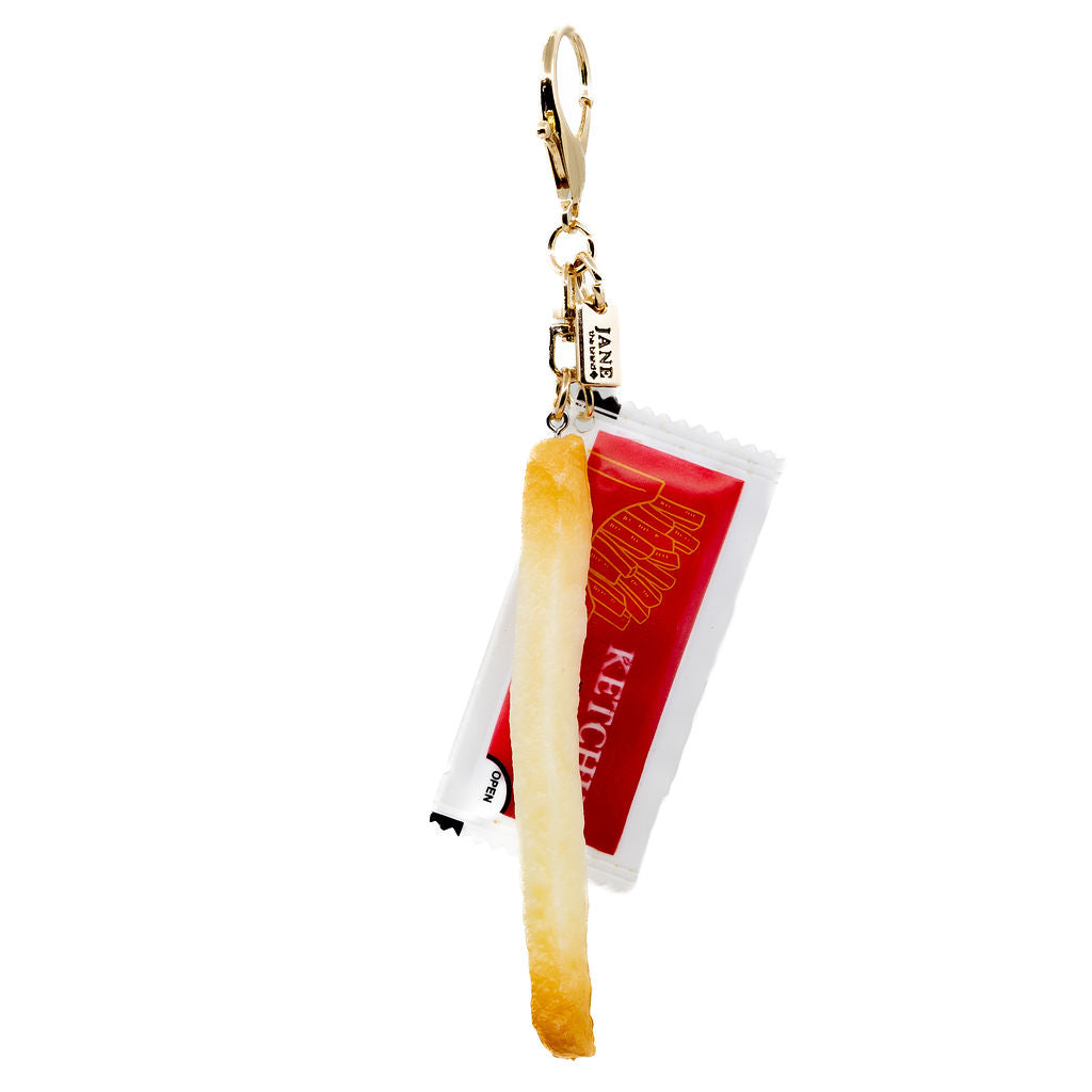 The ultimate duo. A crispy golden fry paired with a mini ketchup packet brings just the right dose of cheeky fun. Warning: may cause cravings.