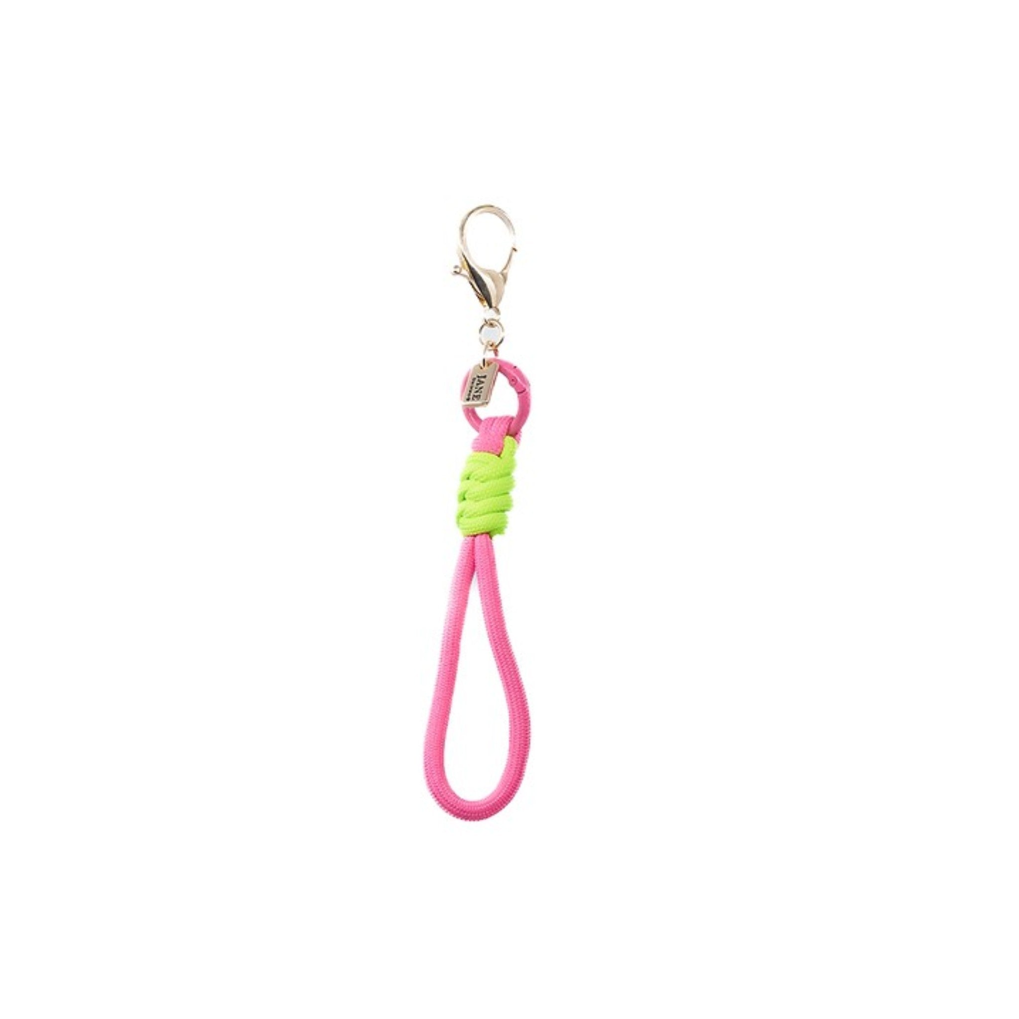 Complete your ensemble with this pink and neon green knotted cord. Its bold colours add a dynamic touch to your charm.&nbsp; Add a touch of fun to your look with this classic bag charm.