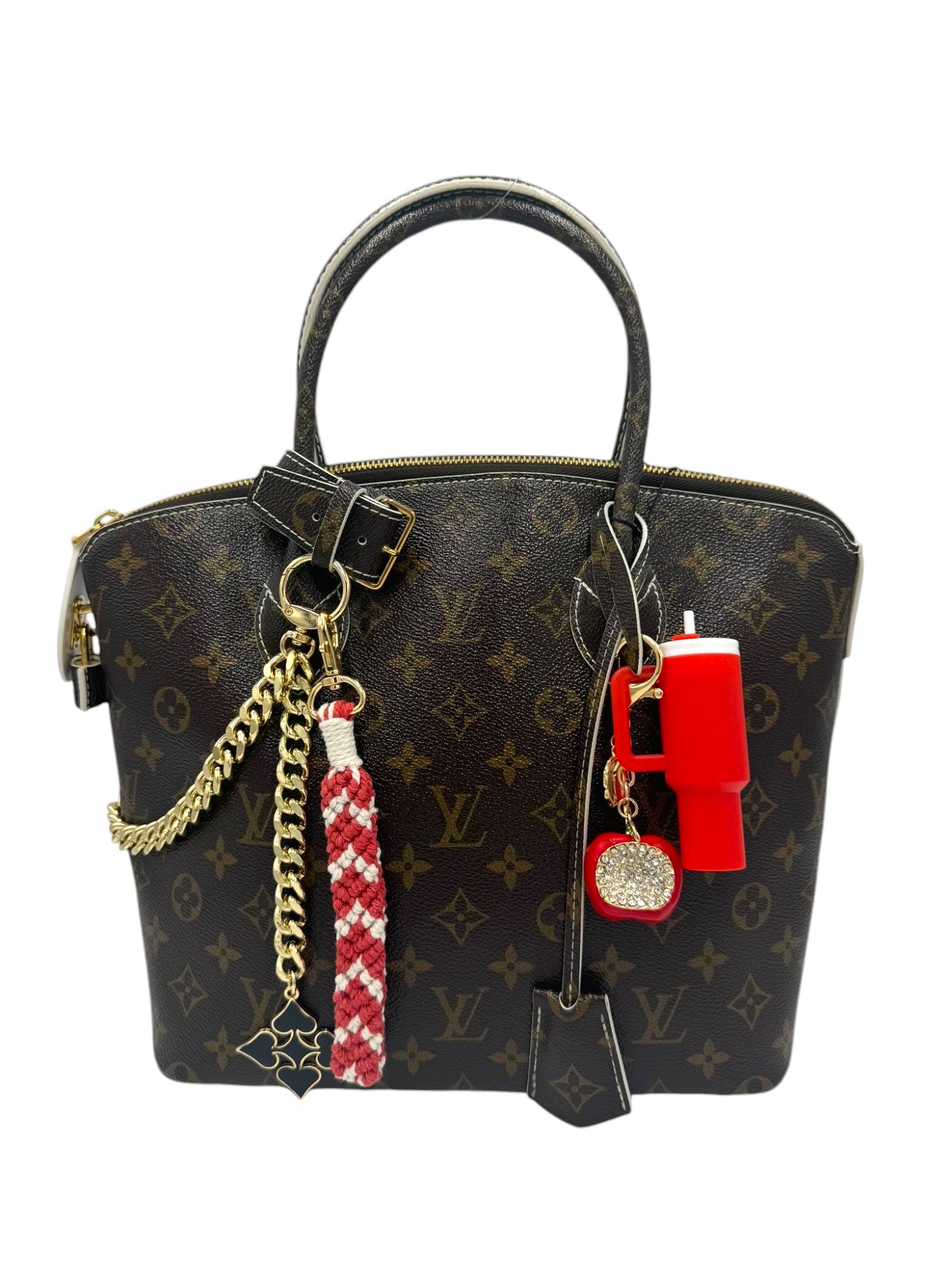 Handcrafted with intricate knots, this red and white macrame charm offers a boho-chic look. Its unique design adds texture and style, making it a versatile accessory for various occasions. 