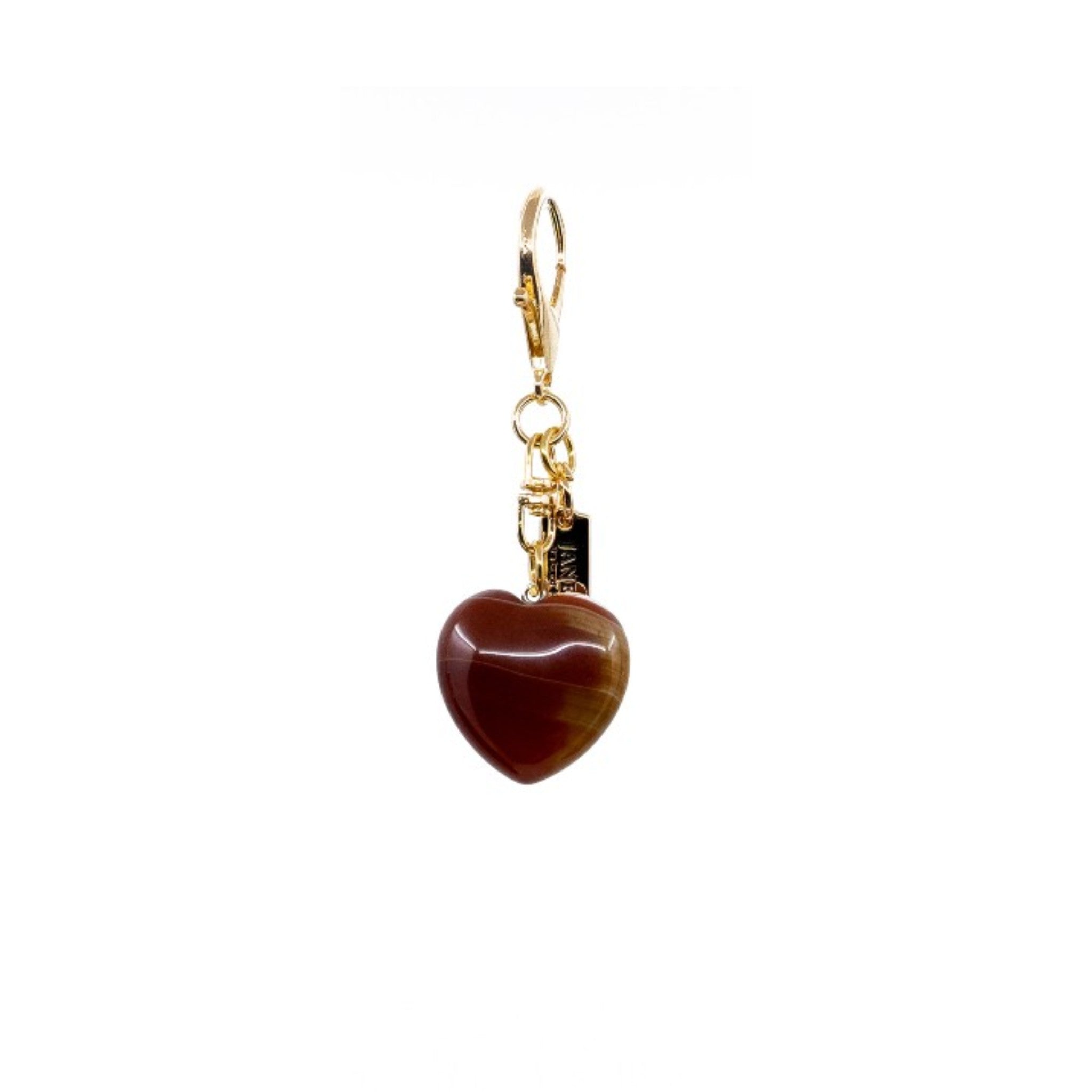 Add a touch of elegance with this dark orange heart stone charm. Its rich hue and smooth finish bring a sophisticated flair to your ensemble, making it a meaningful addition to your collection. Ideal for expressing love and adding depth to your accessories.