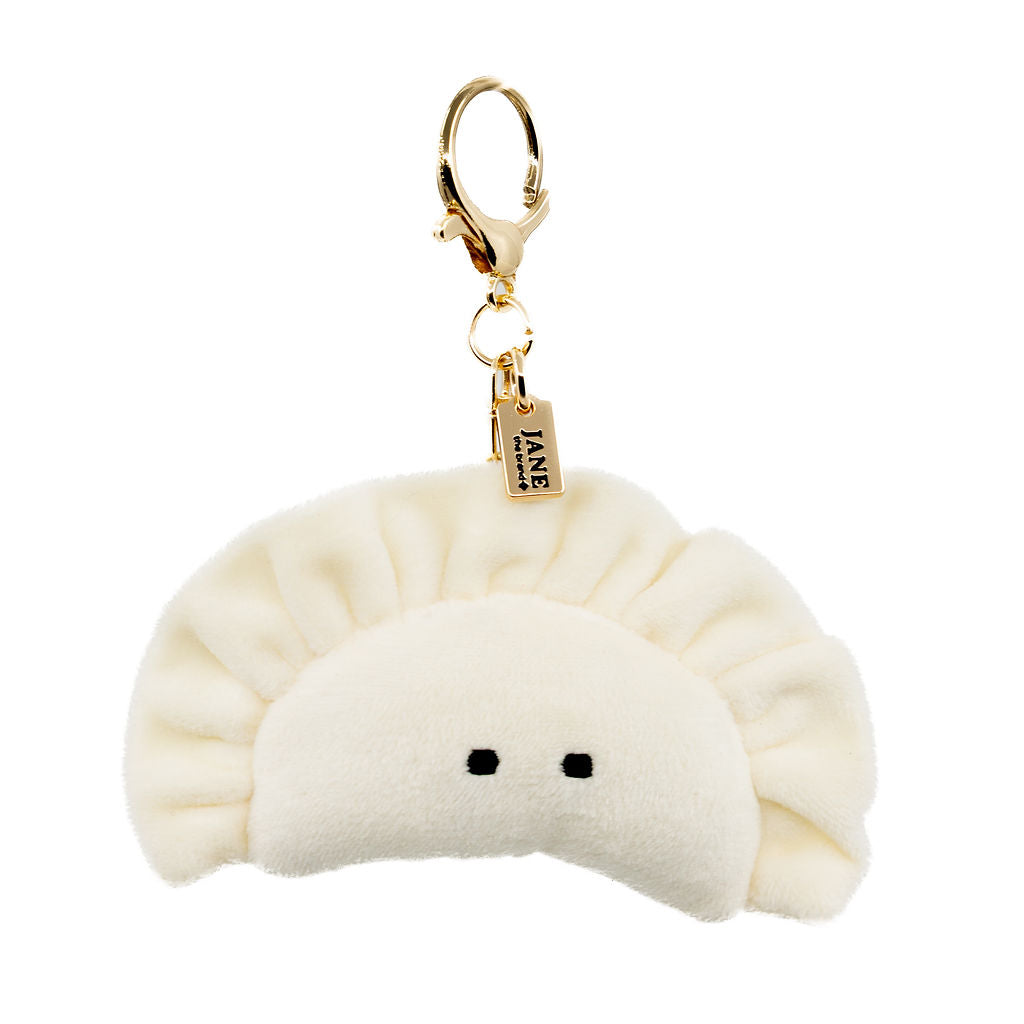 A charming plush gyoza you’ll want to take everywhere. Soft, sweet, and undeniably cute, this little charm brings joy to any purse, backpack, or keychain.