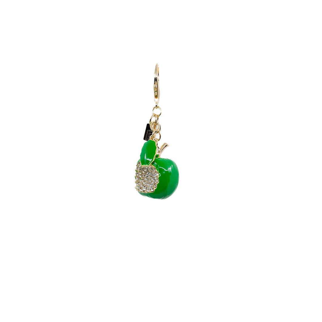 The Alexis Charming Bag Charm Set Features a green stanley cup charm paired with a green metal apple and green/white macrame, creating a vibrant accessory set.  Purse Charm Bag Charm