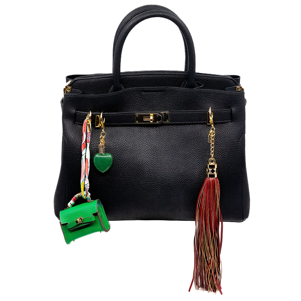 Bring a touch of bohemian flair with this burgundy faux-leather tassel charm. Its sleek design adds movement and texture, perfect for layering on your bag. The rich burgundy hue complements various styles, making it a versatile accessory for any occasion.