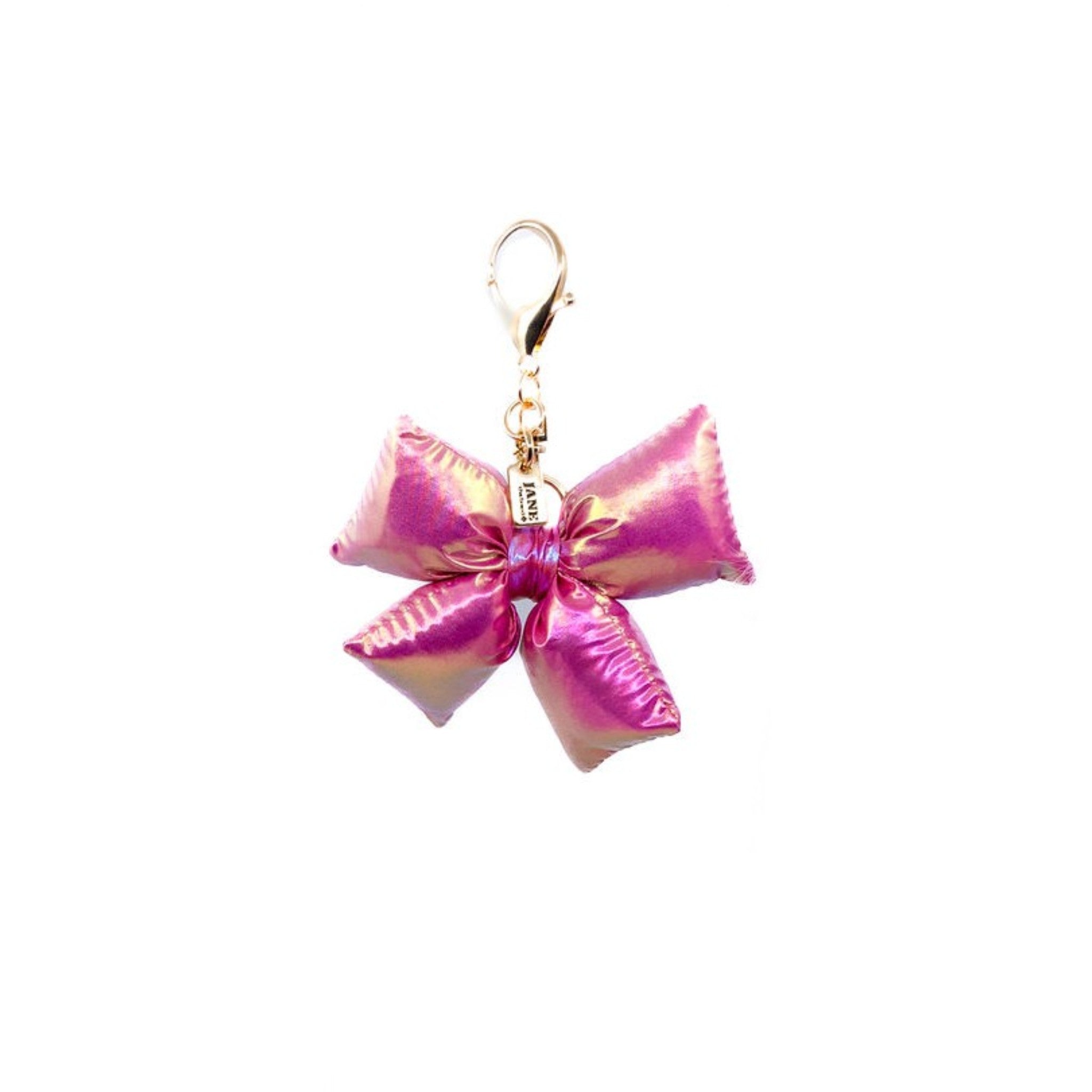 Introduce a playful pop to your look with this iridescent puffy bow charm. Its soft lavender/pink hue and voluminous design bring a whimsical touch, making it a delightful addition to your bag. A sweet way to express your fun-loving personality.