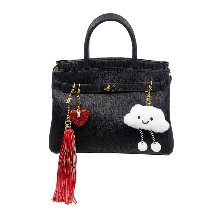 Bring a touch of bohemian flair with this long faux-leather tassel. Its sleek design adds movement and texture, perfect for layering on your bag.