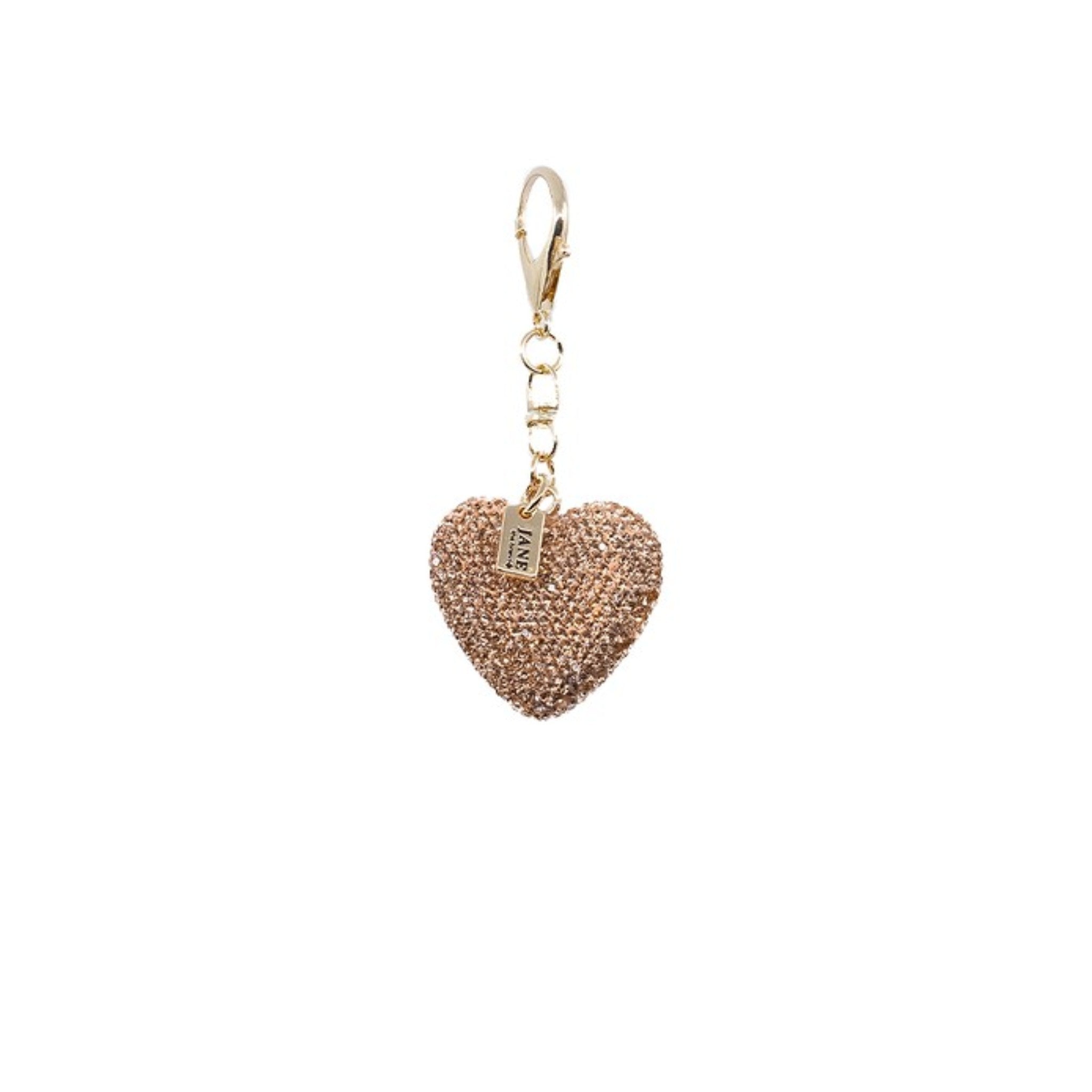 Express your love and affection with this charming heart, featuring a dazzling, sparkling finish. The perfect addition to any accessory, this heart brings both romance and shimmer to your look, elevating your style with ease.