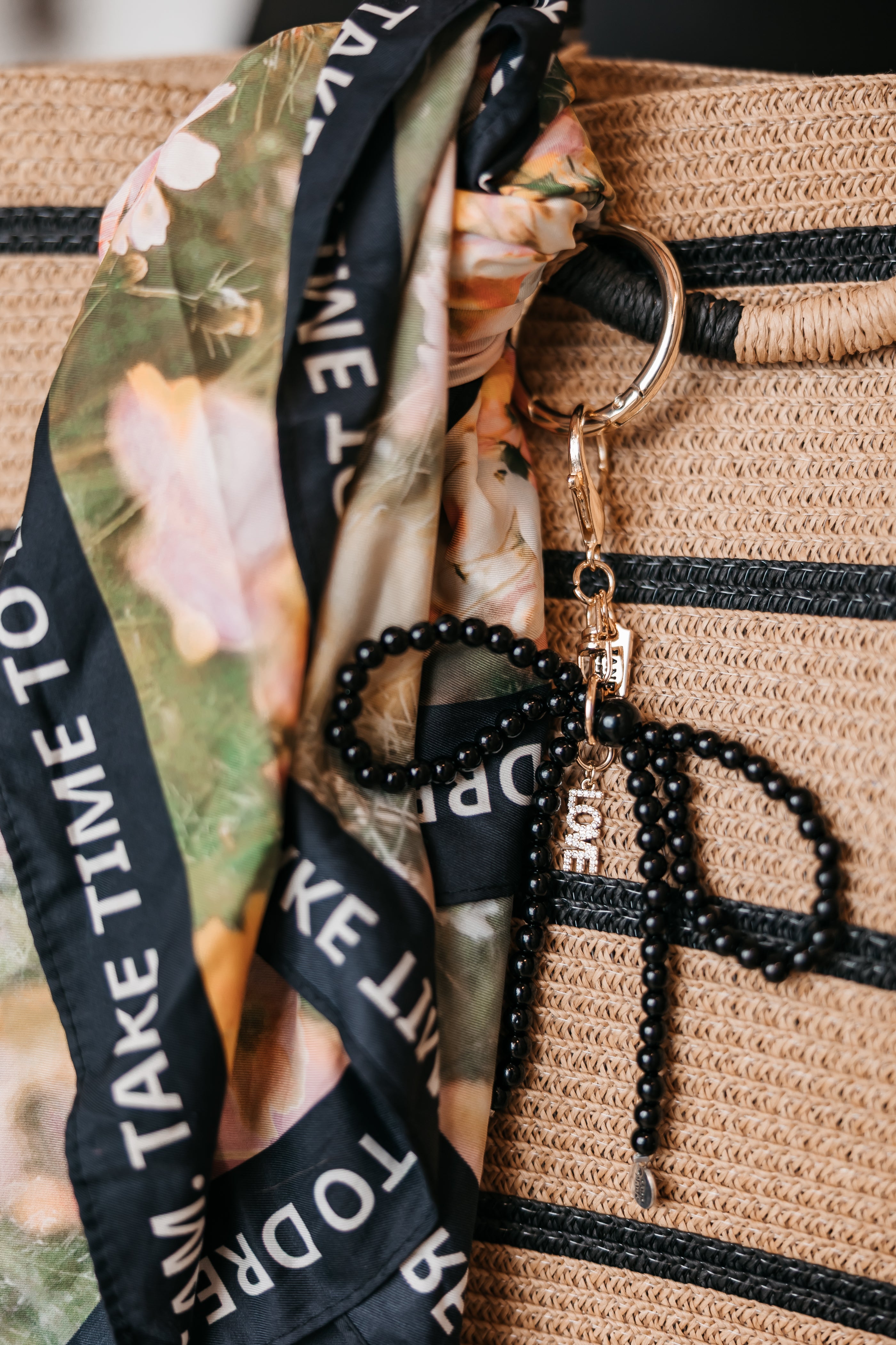 Pearl Bow Single Strand Charm in Black