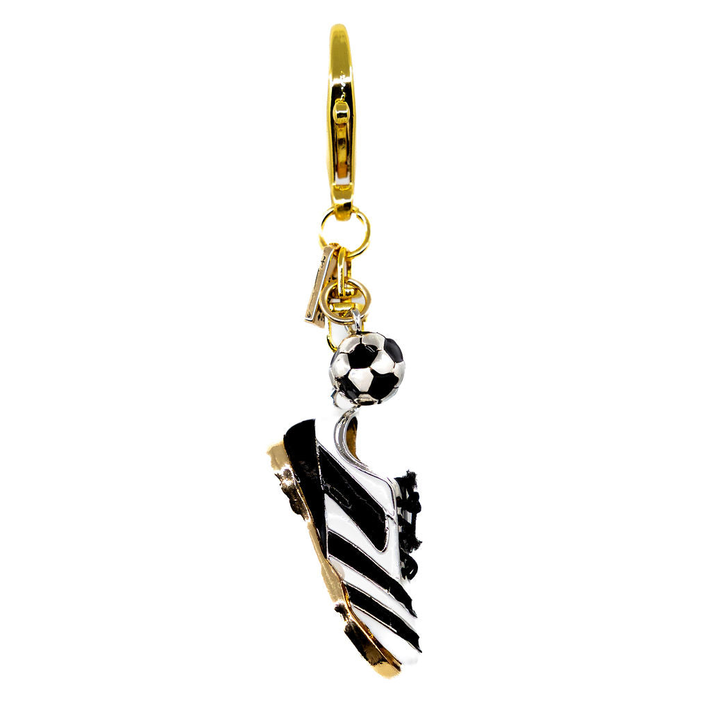 Gold charm with a black and white soccer cleate