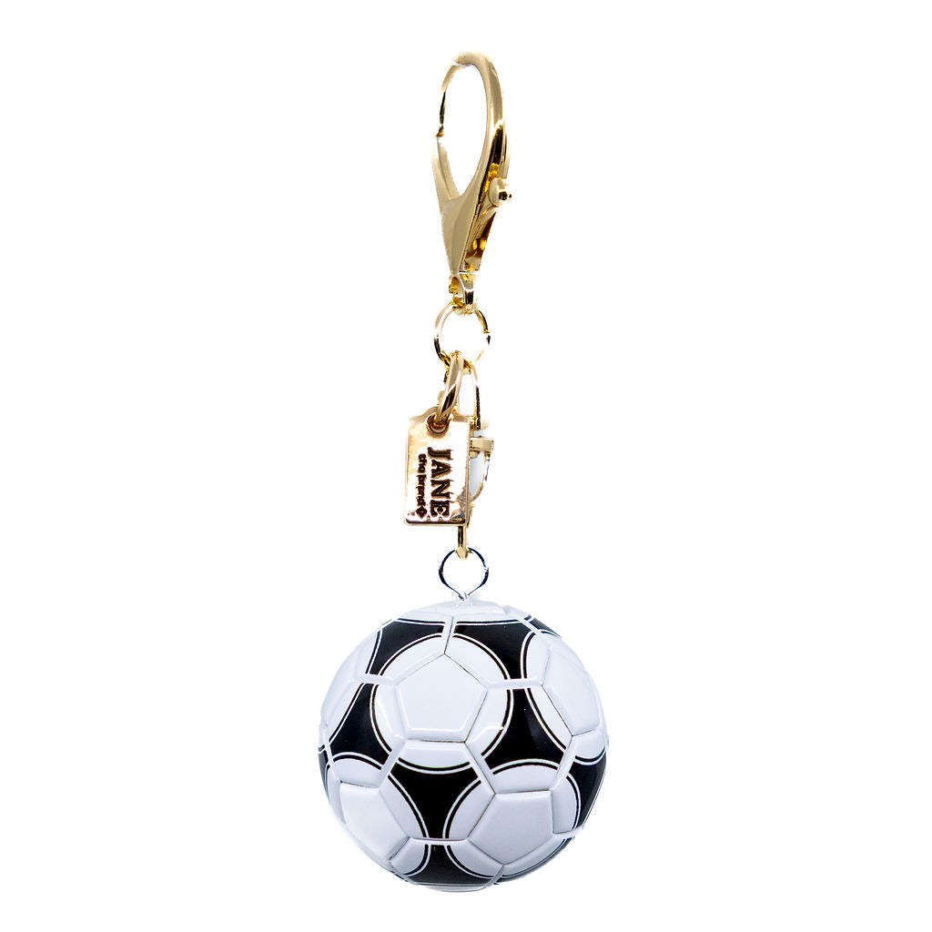 charm with a soccer ball design. bag charm