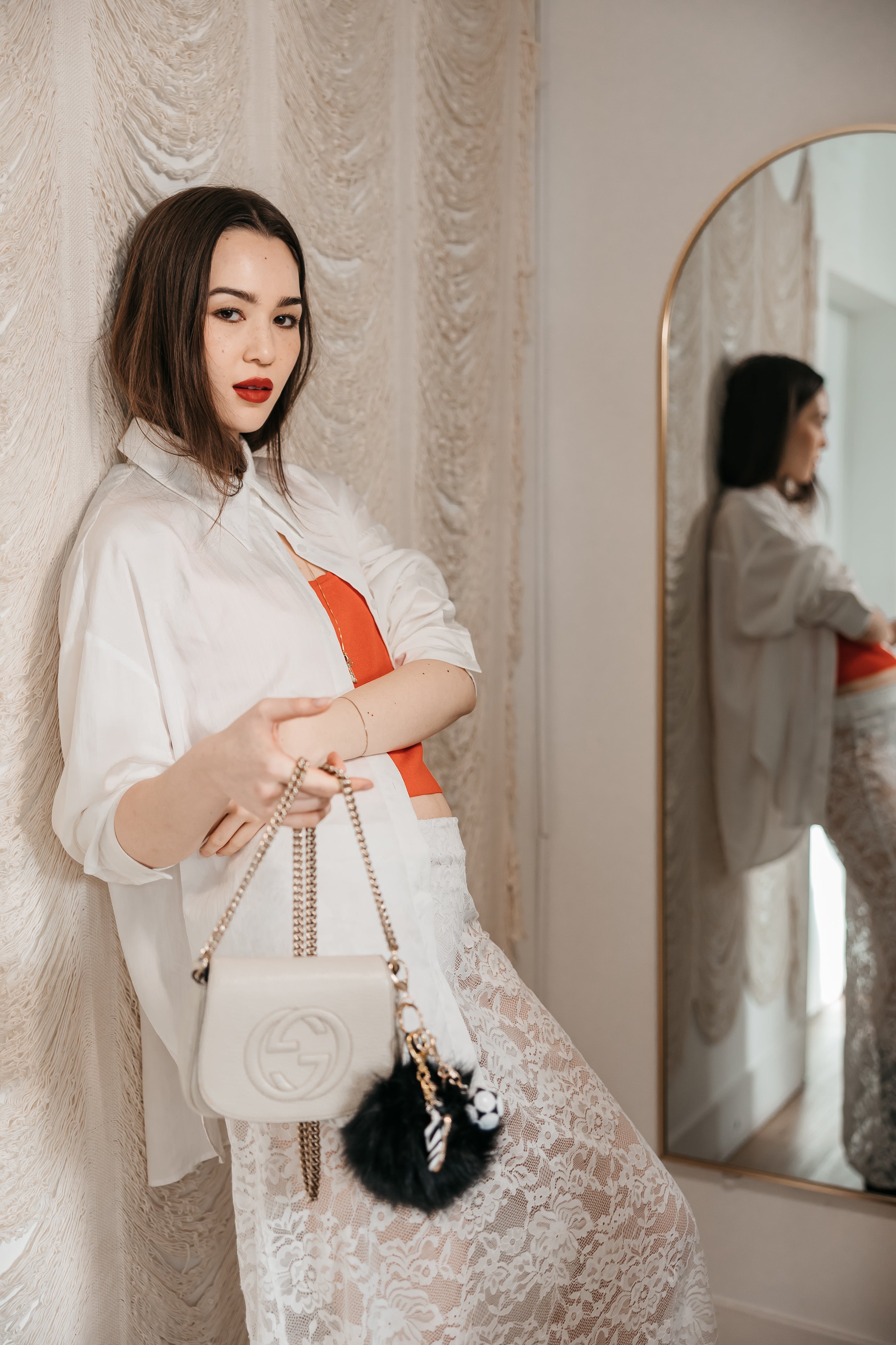 women holding purse with charms soccer pom cleat ball purse charms