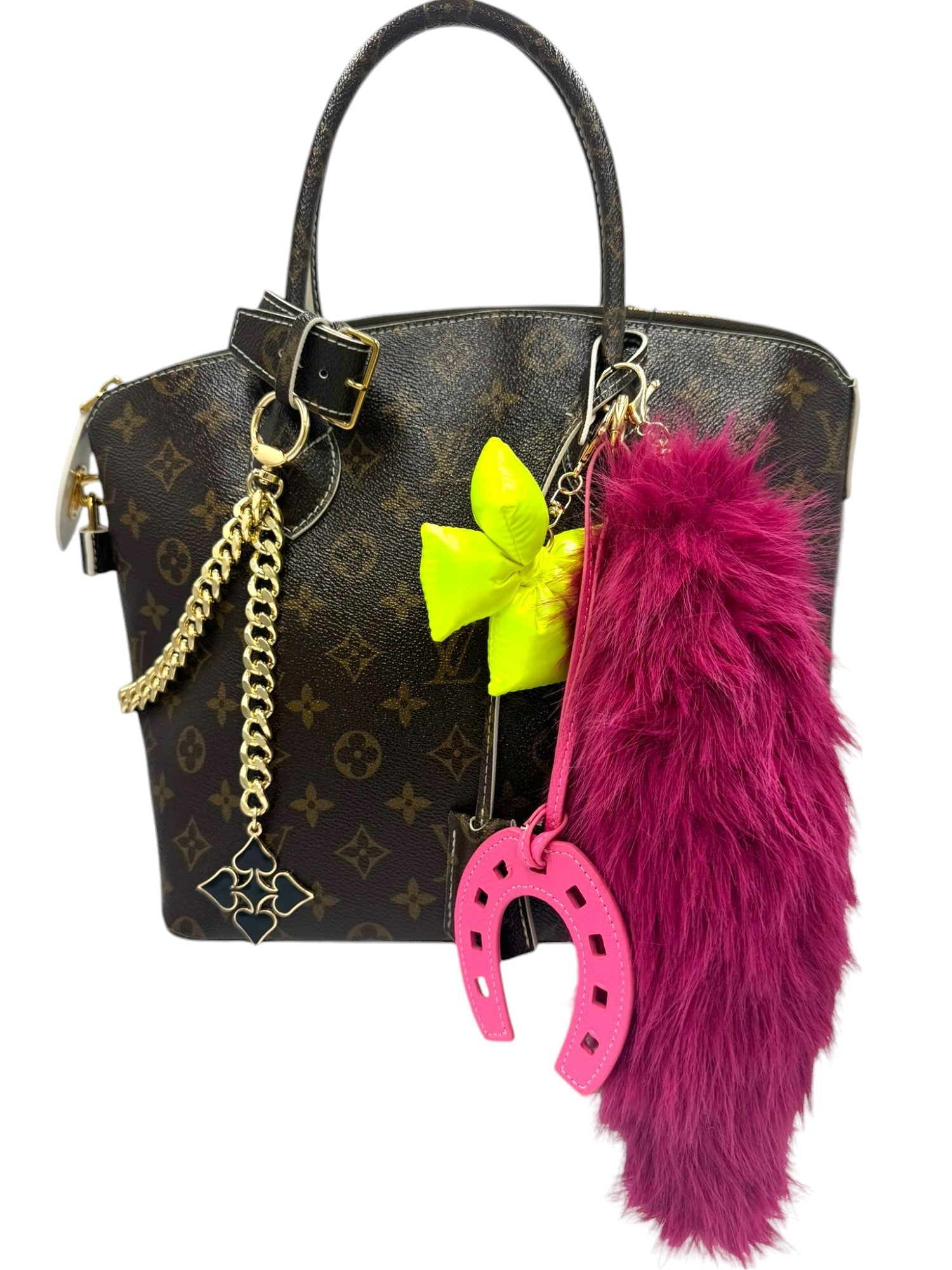 The Elle - Confident Purse Charms
Exude confidence with this rich burgundy faux-fur pendant charm. Its deep hue and plush texture add a bold statement to your accessories, perfect for those who embrace their inner strength.